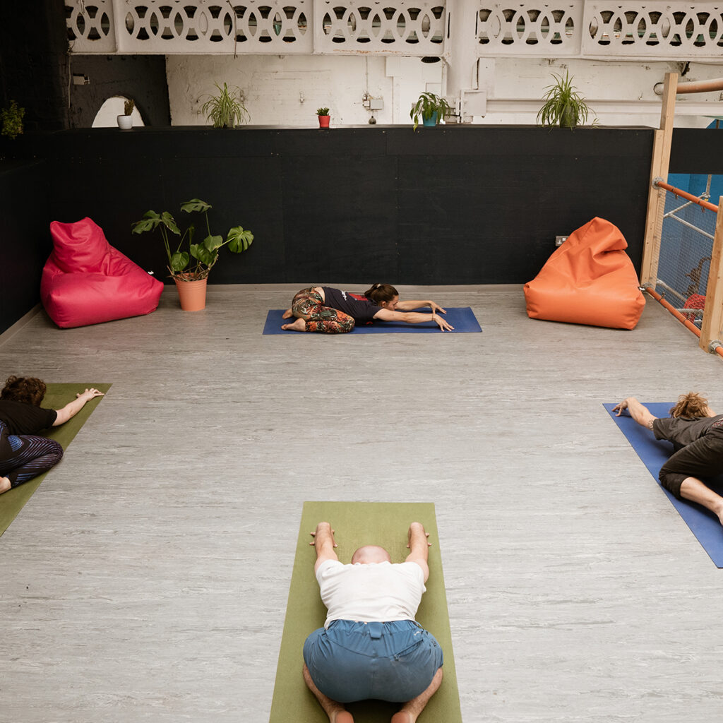 Social distance yoga at city bloc
